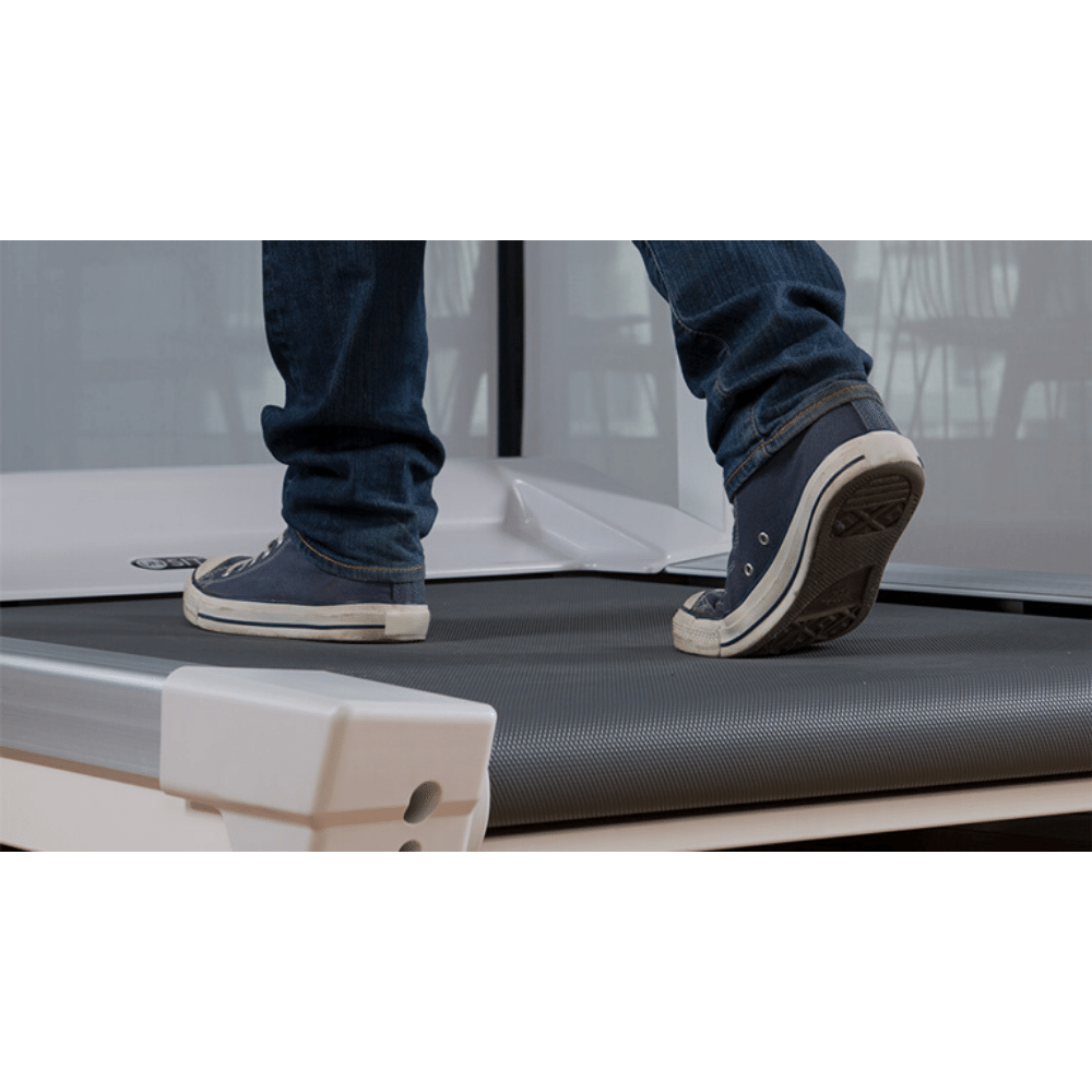 A photo of a someone walking on the Unsit treadmill