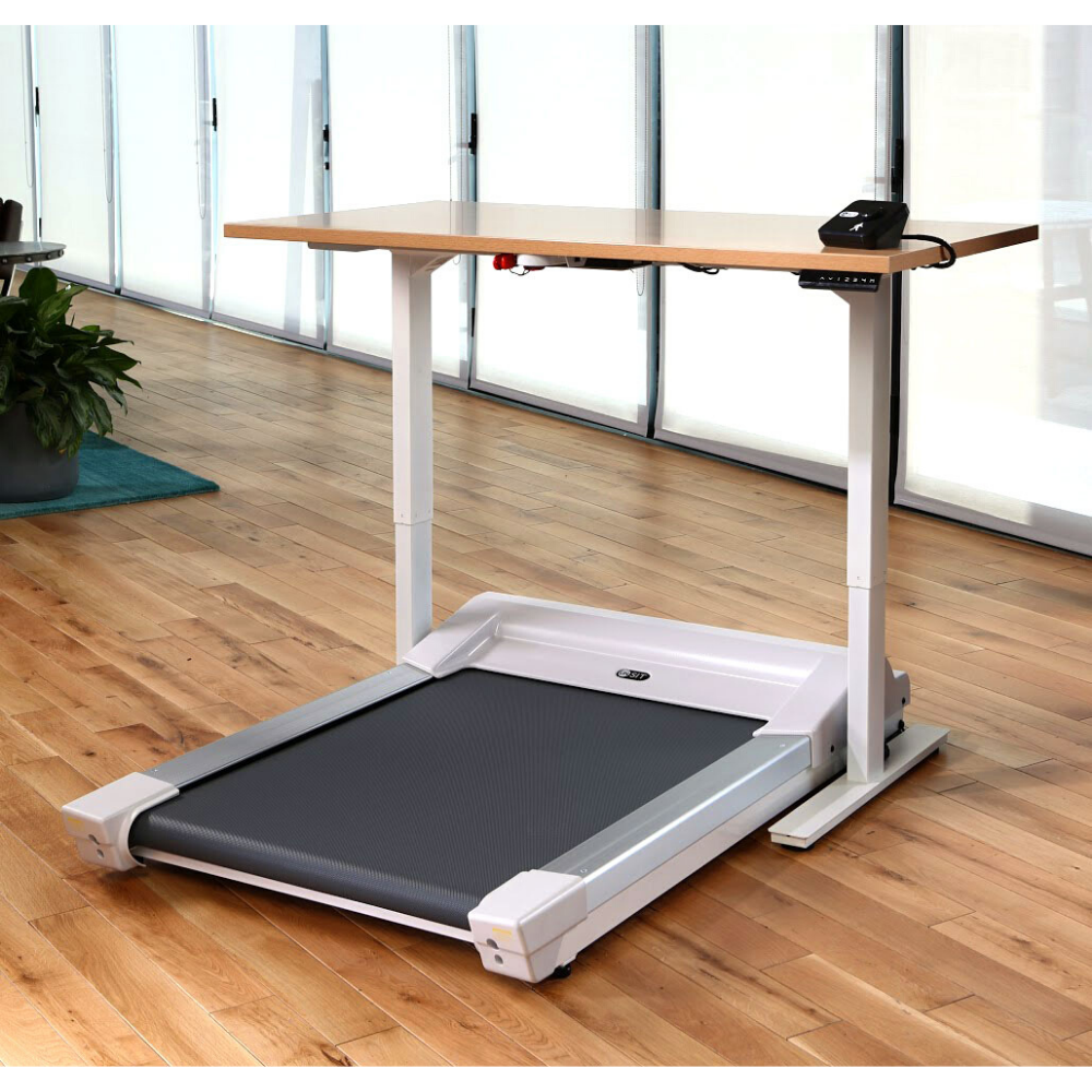 A photo of the Unsit treadmill desk bundle in an office space on hardwood floors